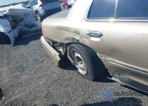 1999 Mercury Grand Marquis Gs z USA, uszkodzony, nr VIN 2MEFM74WXXX641690